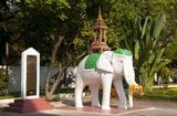 In 1436, King Sam Fang Kaen of Chiang Mai arranged for a procession of the Emerald Buddha image from Chiang Rai to Chiang Mai. The elephant carrying the image ran towards Lampang and on reaching Lampang refused to move. The king issued an order to place the image within Wat Phra Kaeo Don Tao. 32 years later it was moved to Chiang Mai.<br/><br/>

Wat Phra Kaeo Don Tao (The Monastery of the Emerald Buddha on the Water Jar Knoll) is Lampang's most important temple having onced housed the Emerald Buddha (Phra Kaeo Morakot). The Emerald Buddha now resides in Bangkok's Wat Phra Kaeo (part of the Grand Palace complex), the most important temple in Thailand.<br/><br/>

Lampang was originally founded during the 7th century Dvaravati period. Nothing remains from these early times, but the city is rich in temples, many of which have a distinctly Burmese flavour as Lampang had a substantial Burmese population in the 19th century, most of whom were involved in the logging industry.